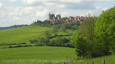 View of the castle on the hilltop overlooking the Auxois plains